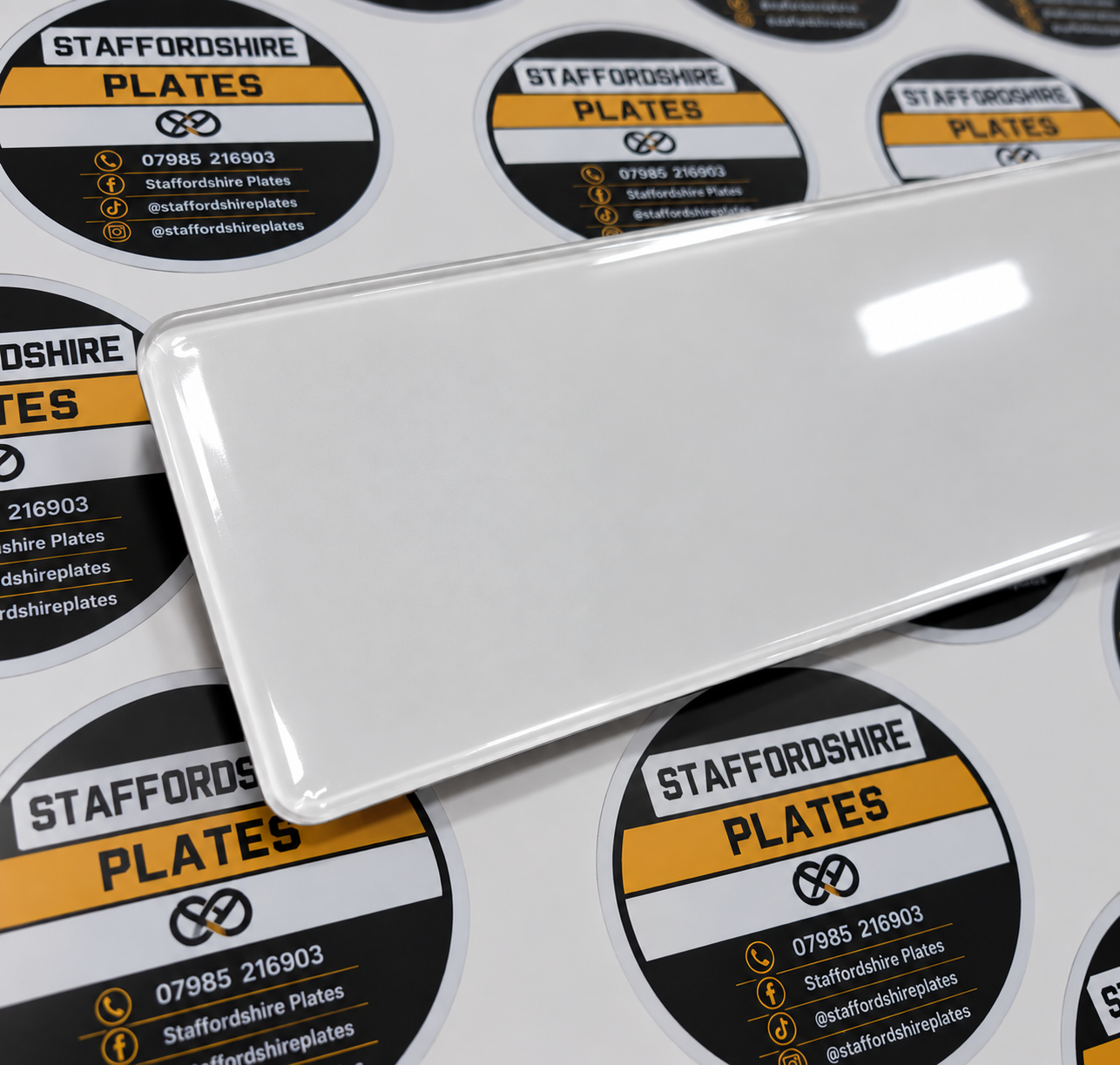Blank white number plate without a badge