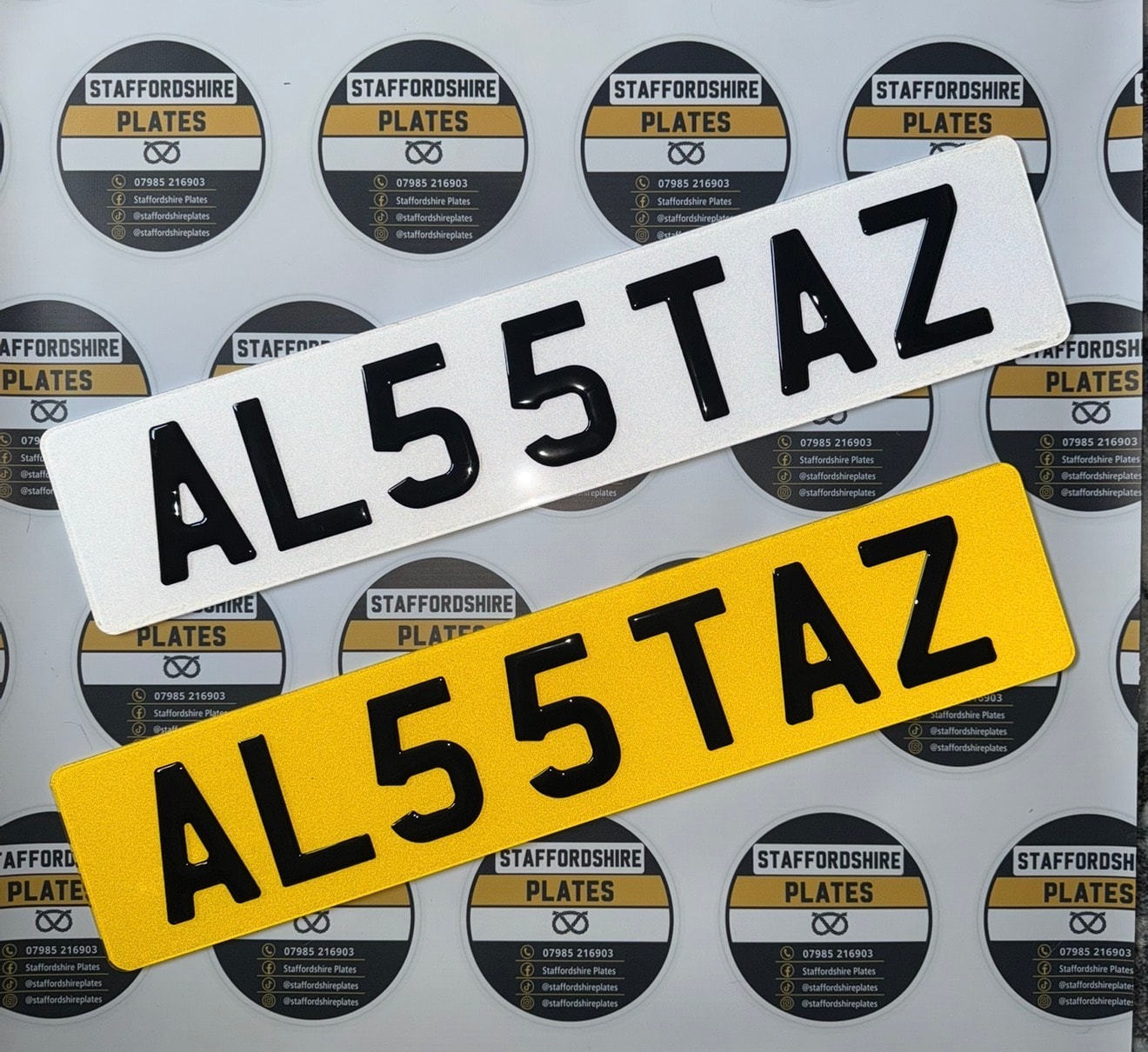 White and yellow AL55 TAZ raised-letter number plates
